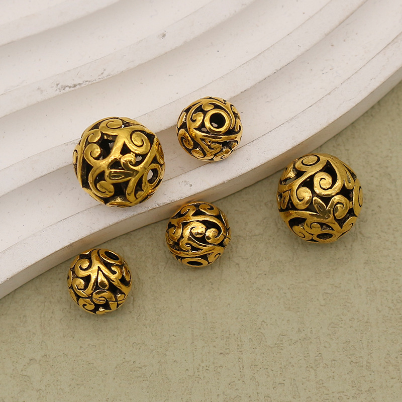 Ancient gold 10mm hole 2mm