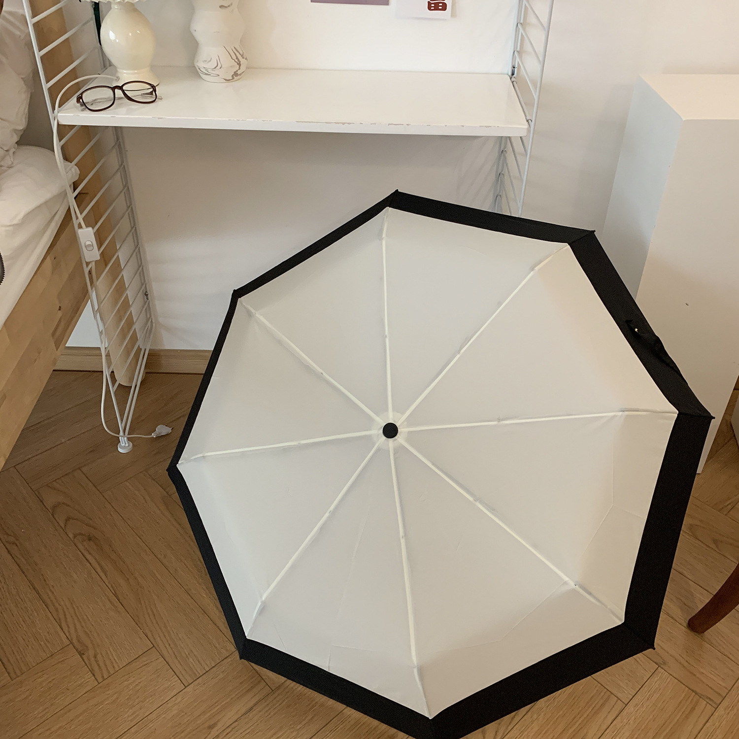 Plain black side with white background