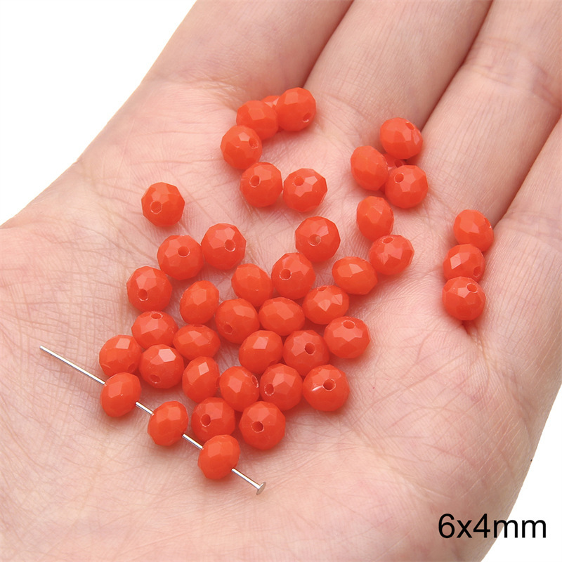 15:Solid color crystal wheel beads 6x 4mm aperture about 1mm orange