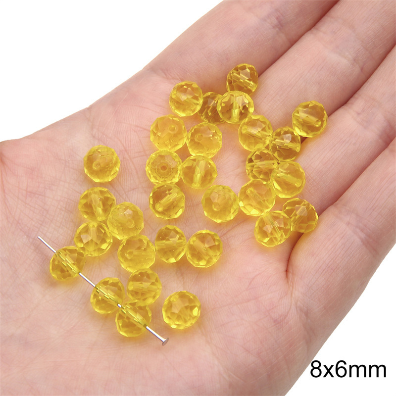17:Transparent crystal wheel beads 8x 6mm aperture about 1mm yellow