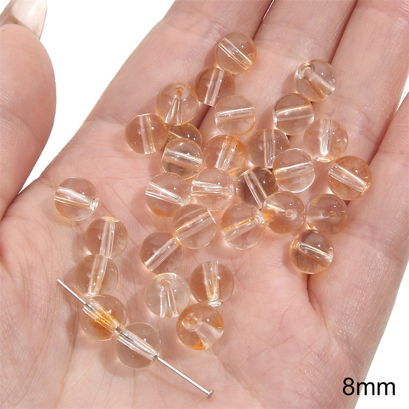 19:Transparent double-piece round bead 8mm aperture about 1mm transparent yellow