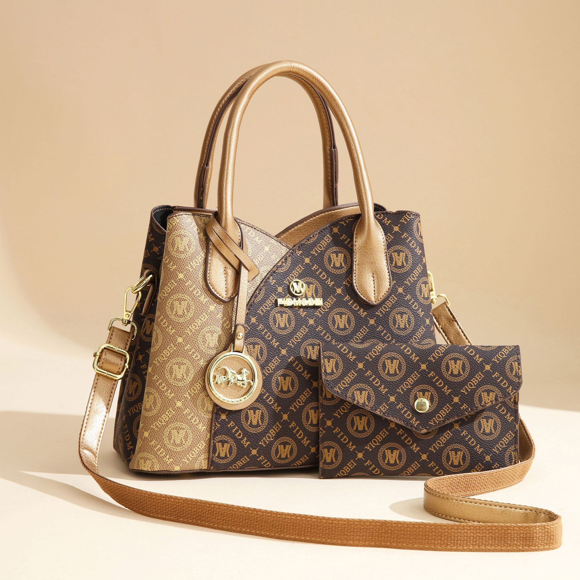 Inverted a gold + small bag