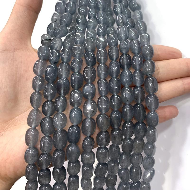 Irregular rectangular columns are dark grey