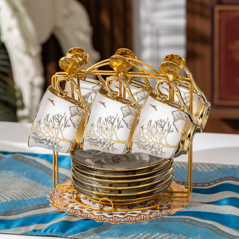 Green trees and golden mountains: 6 cups, 6 plates, and 6 spoons