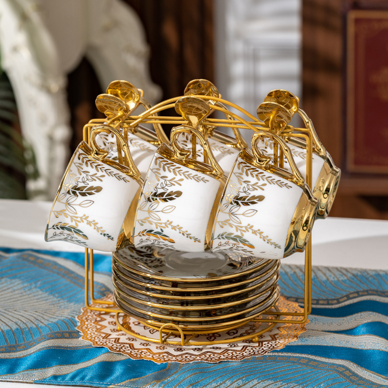 Six cups, six plates and golden spoons of golden branches and jade leaves