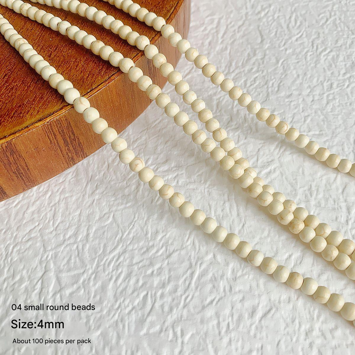 4:04 small round beads (one)