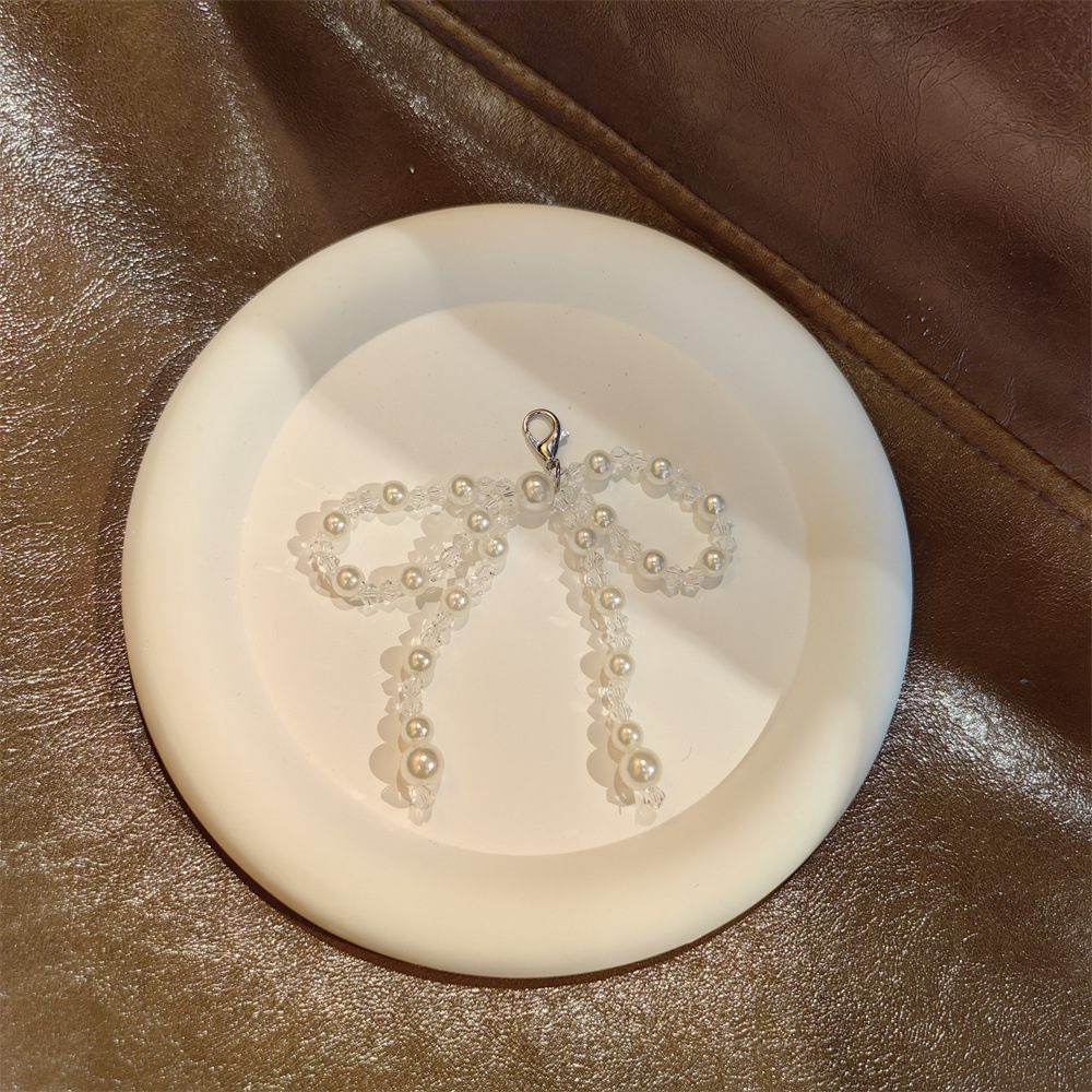 Transparent pearl spaced bow shoe flower string