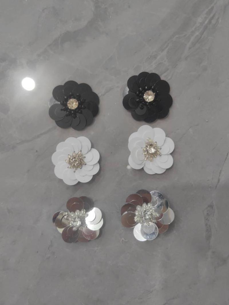28:Two sequined flowers each of silver + white + black