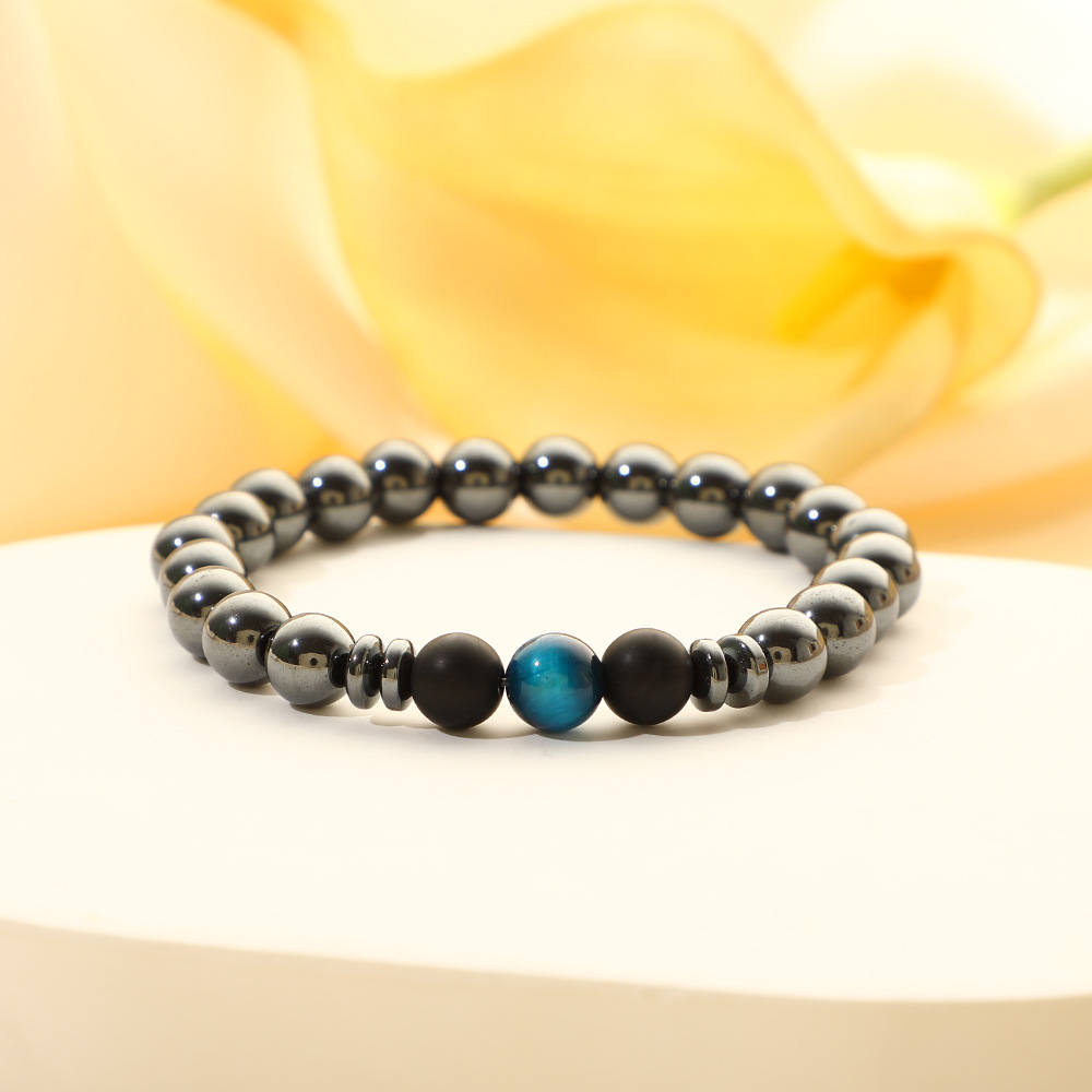 Black gallstone + blue tiger's eye