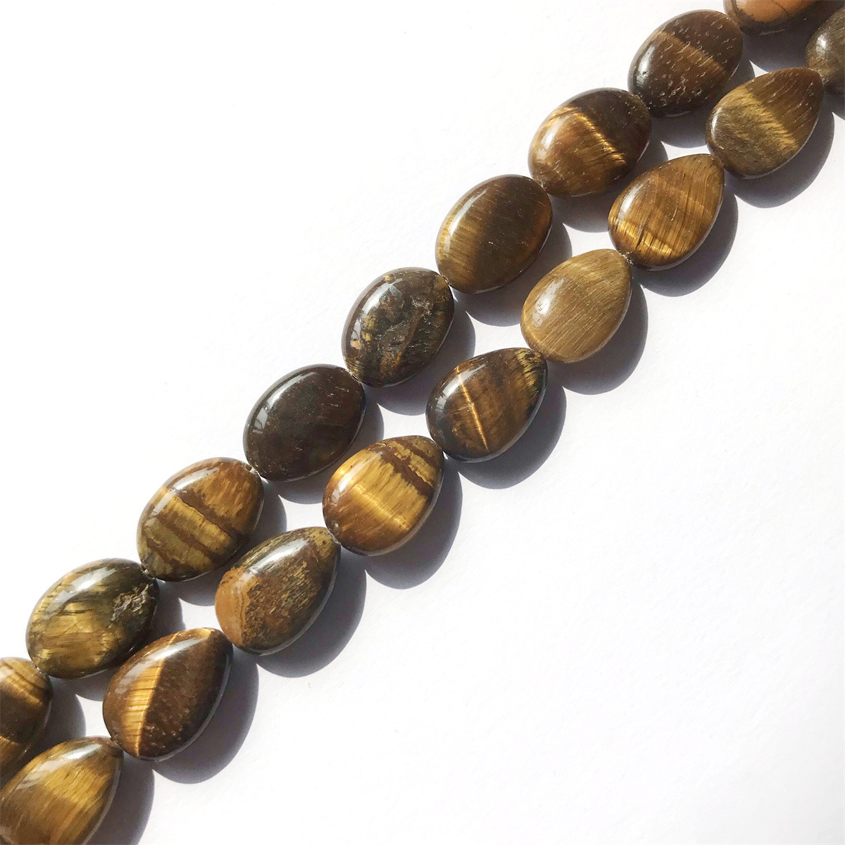 02-tiger eye stone 12*18mm egg-shaped, about 22 pi