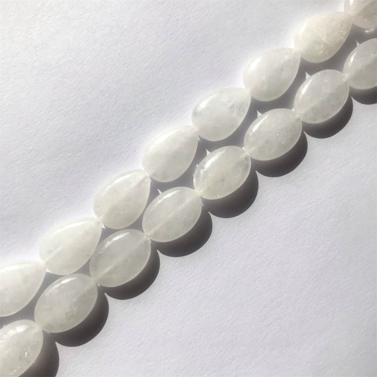 03-white jade 12*18mm egg-shaped, about 22 pieces
