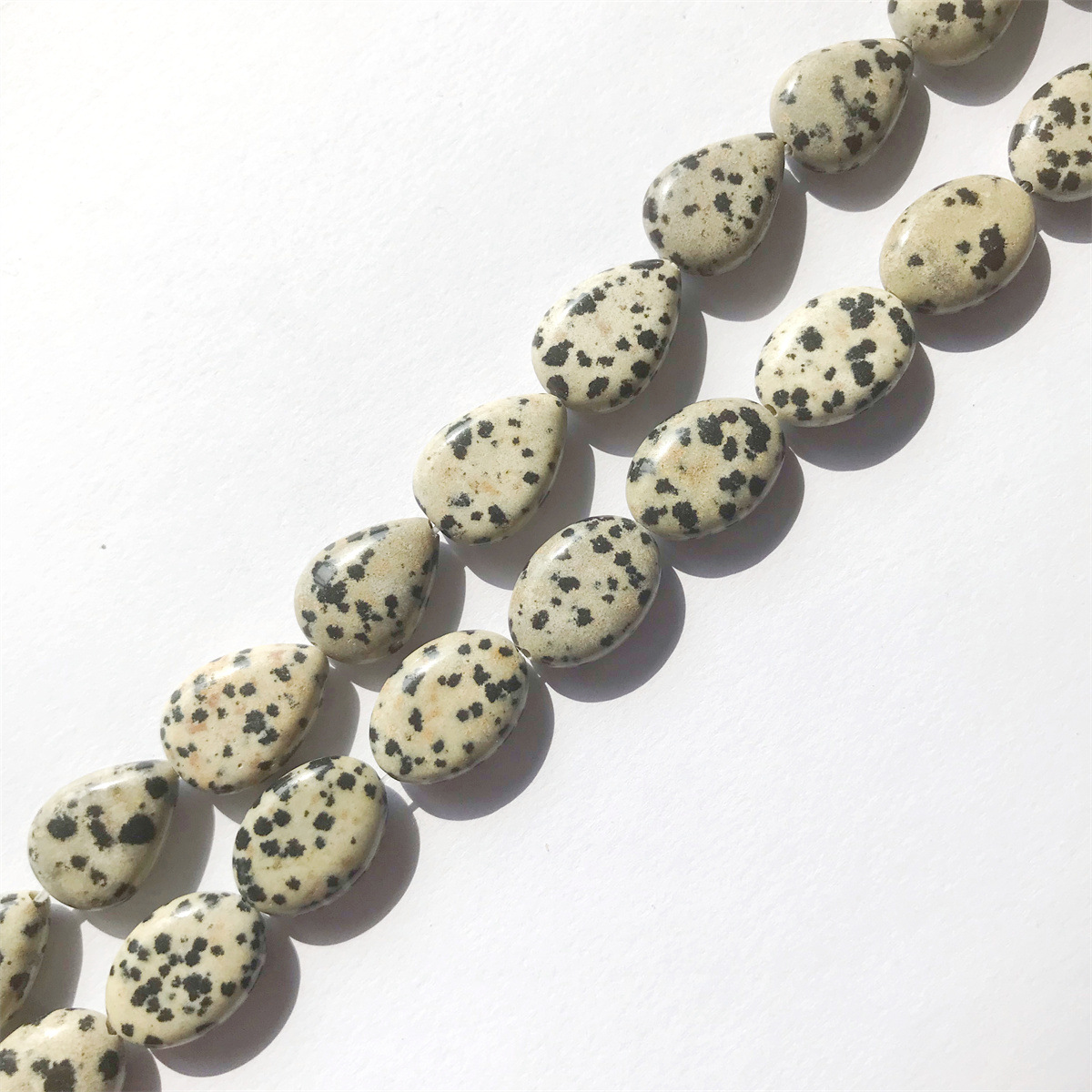 06-spotted stone 12*18mm egg-shaped, about 22 piec