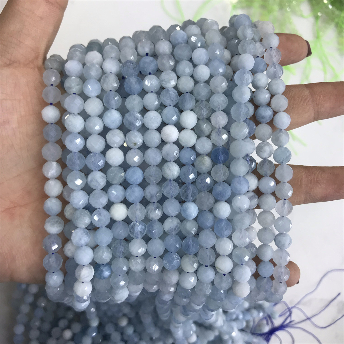 03-6mm aquamarine 5-6mm faceted round beads, one p