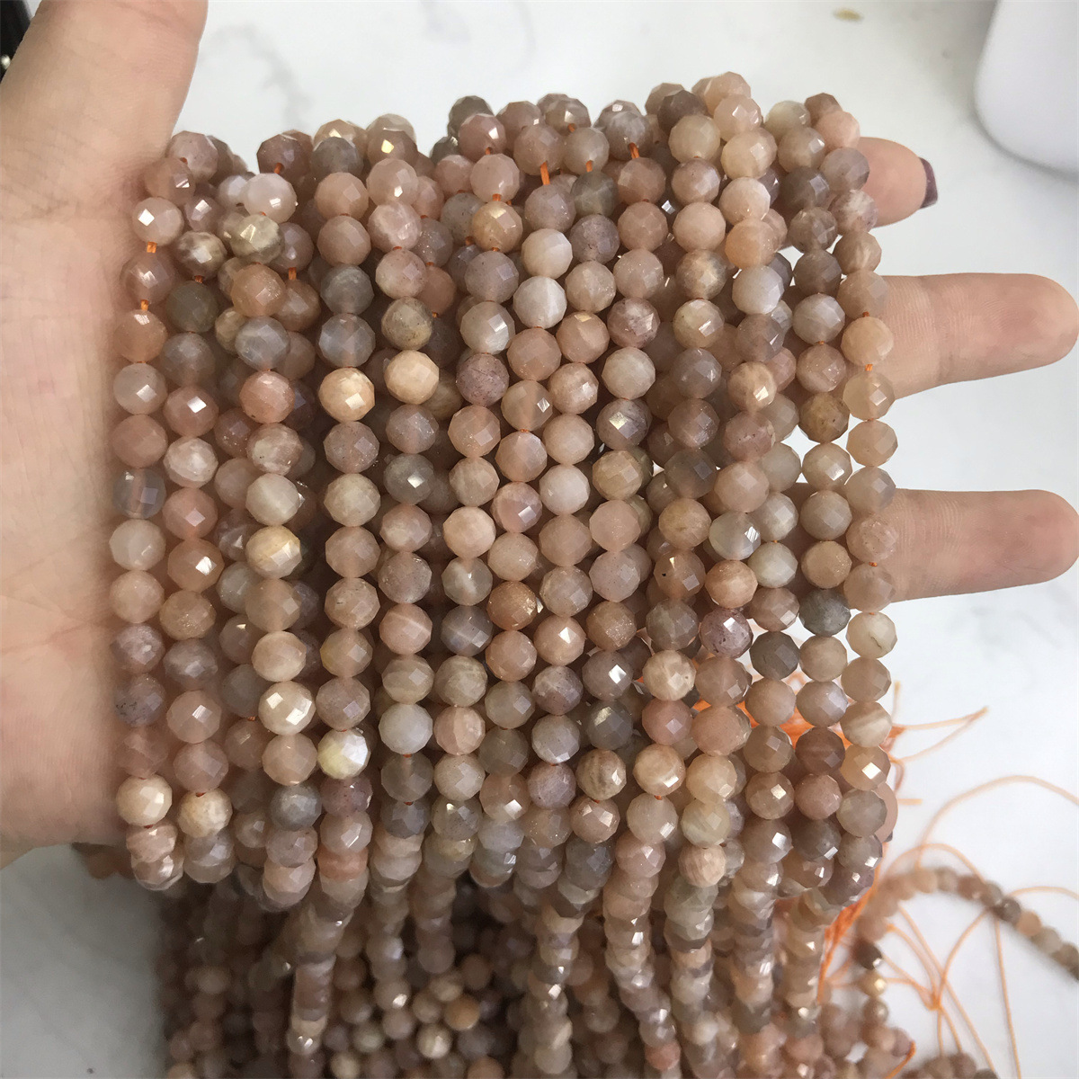 10-6mm sunstone 5-6mm faceted round beads, one pie