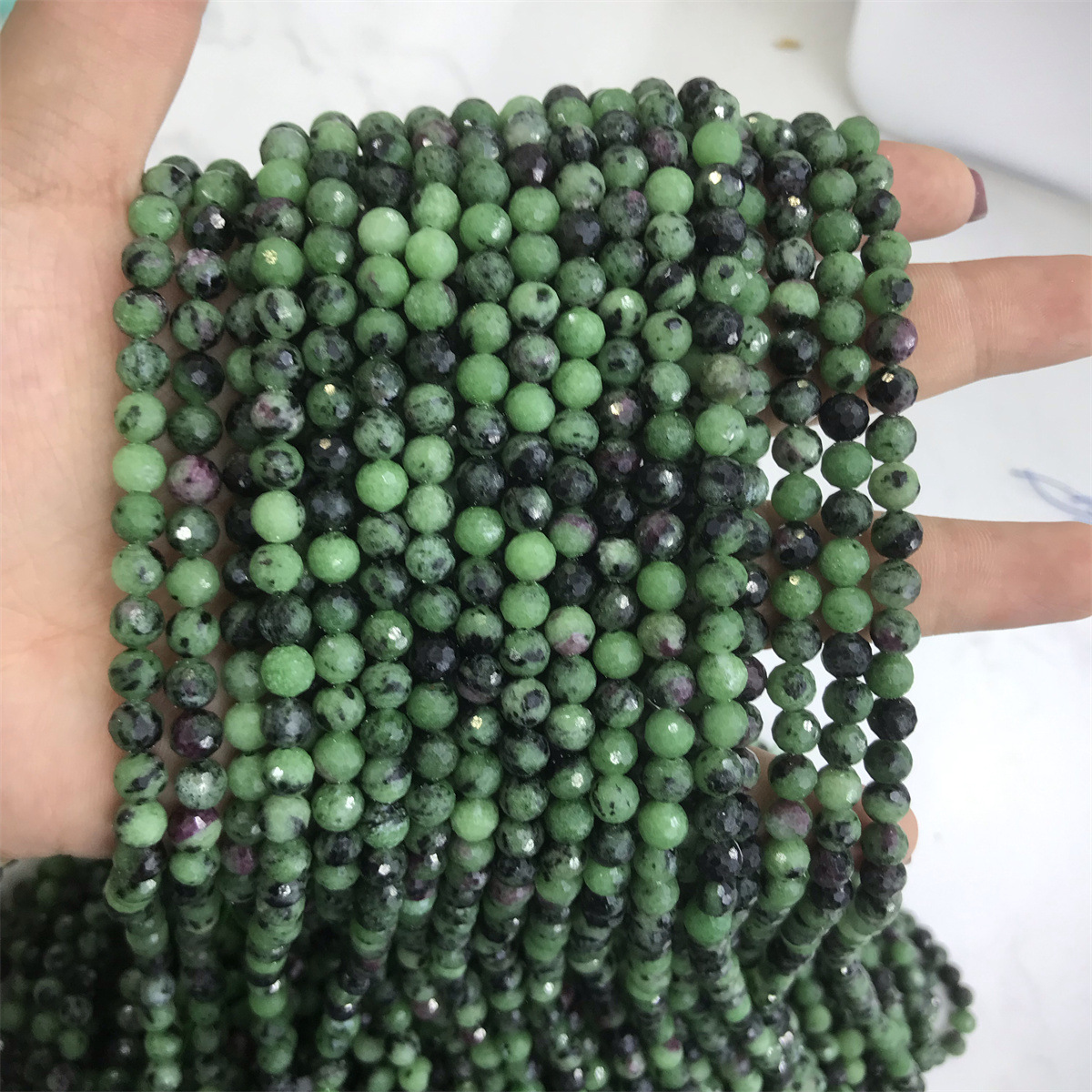 16-6mm red and green treasure 5-6mm faceted round