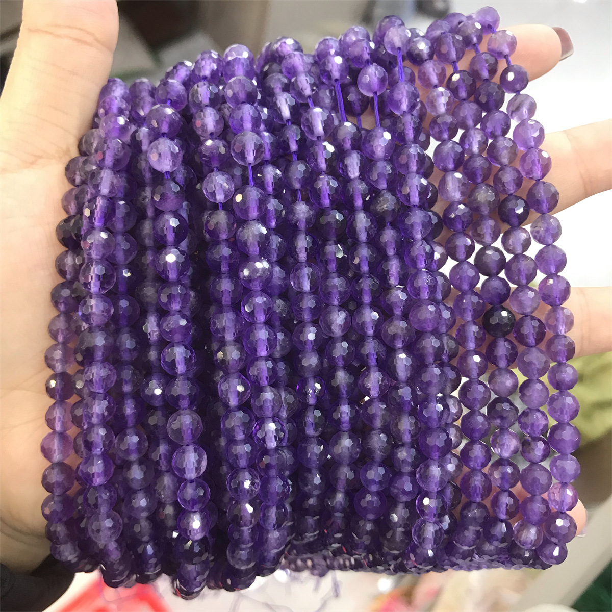 21-6mm amethyst 5-6mm faceted round beads, one pie