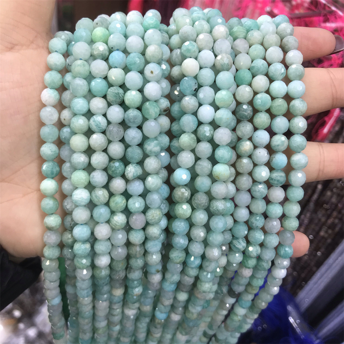 29-5mm amazonite 5-6mm faceted round beads, one pi