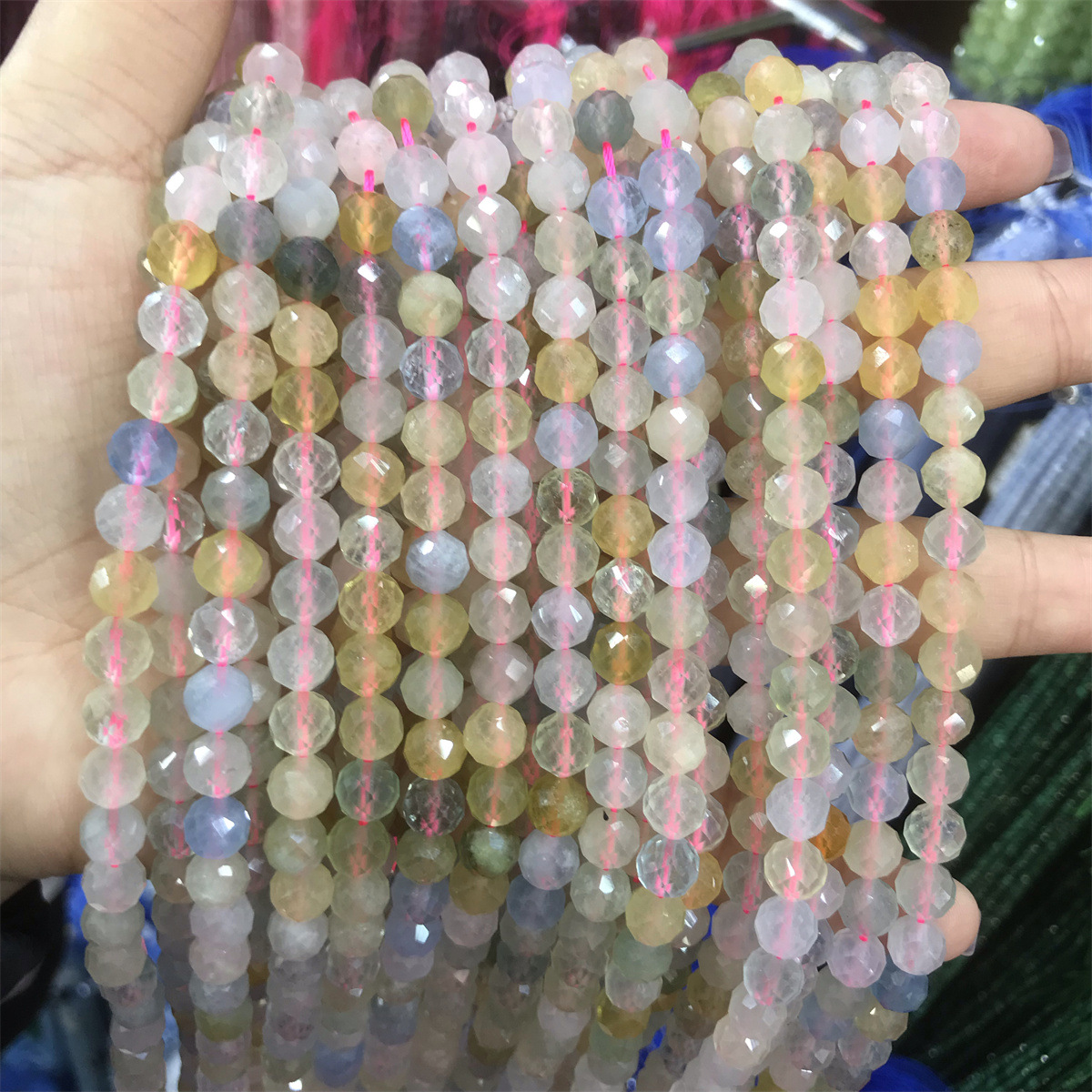 31-6mm morganite 5-6mm faceted round beads, one pi