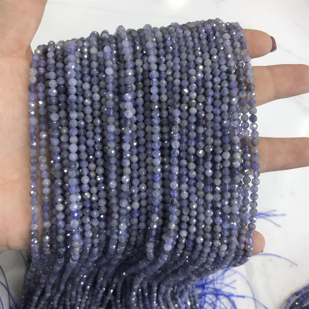 1:3mm faceted round beads tanzanite
