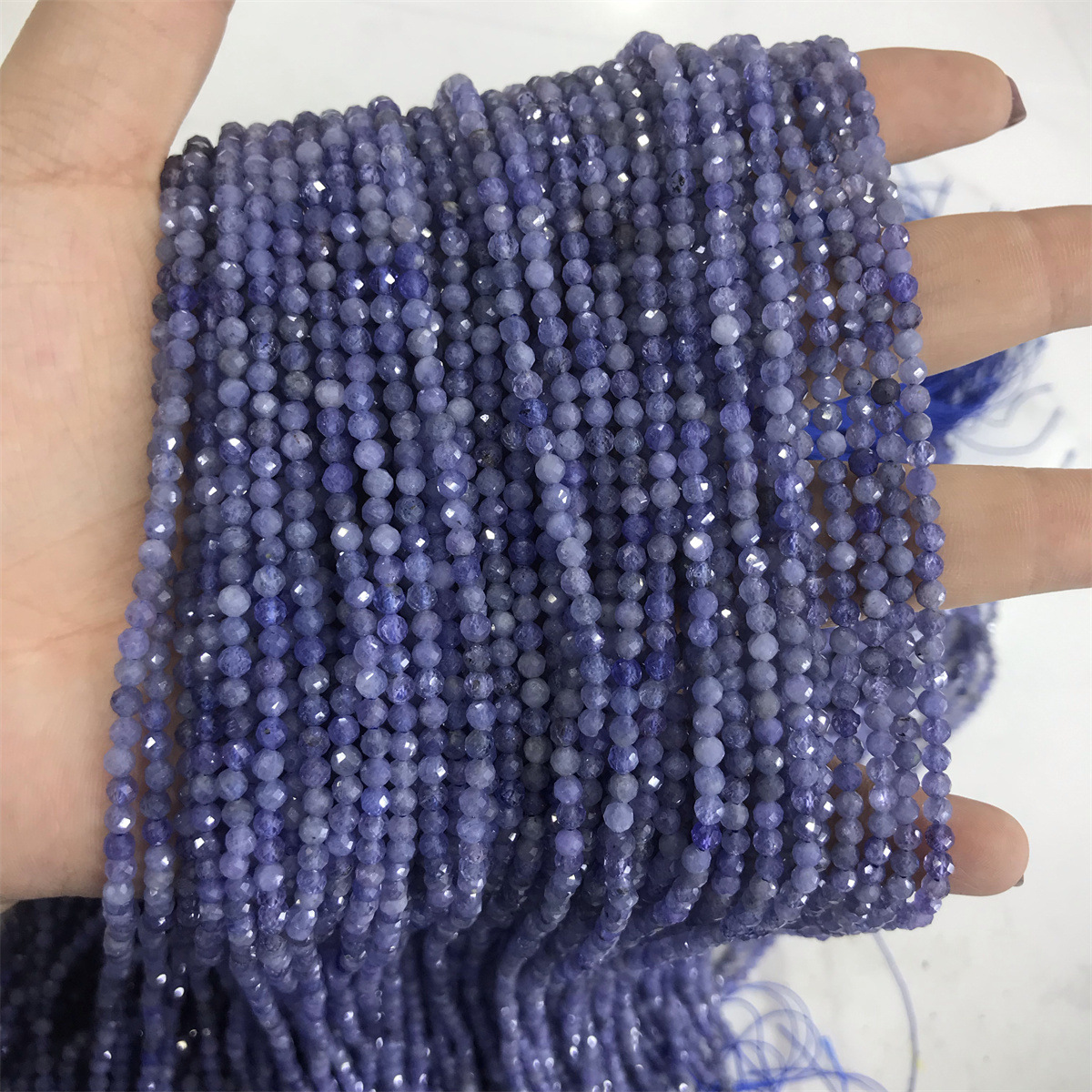 5:3mm faceted round bead grade a tanzanite