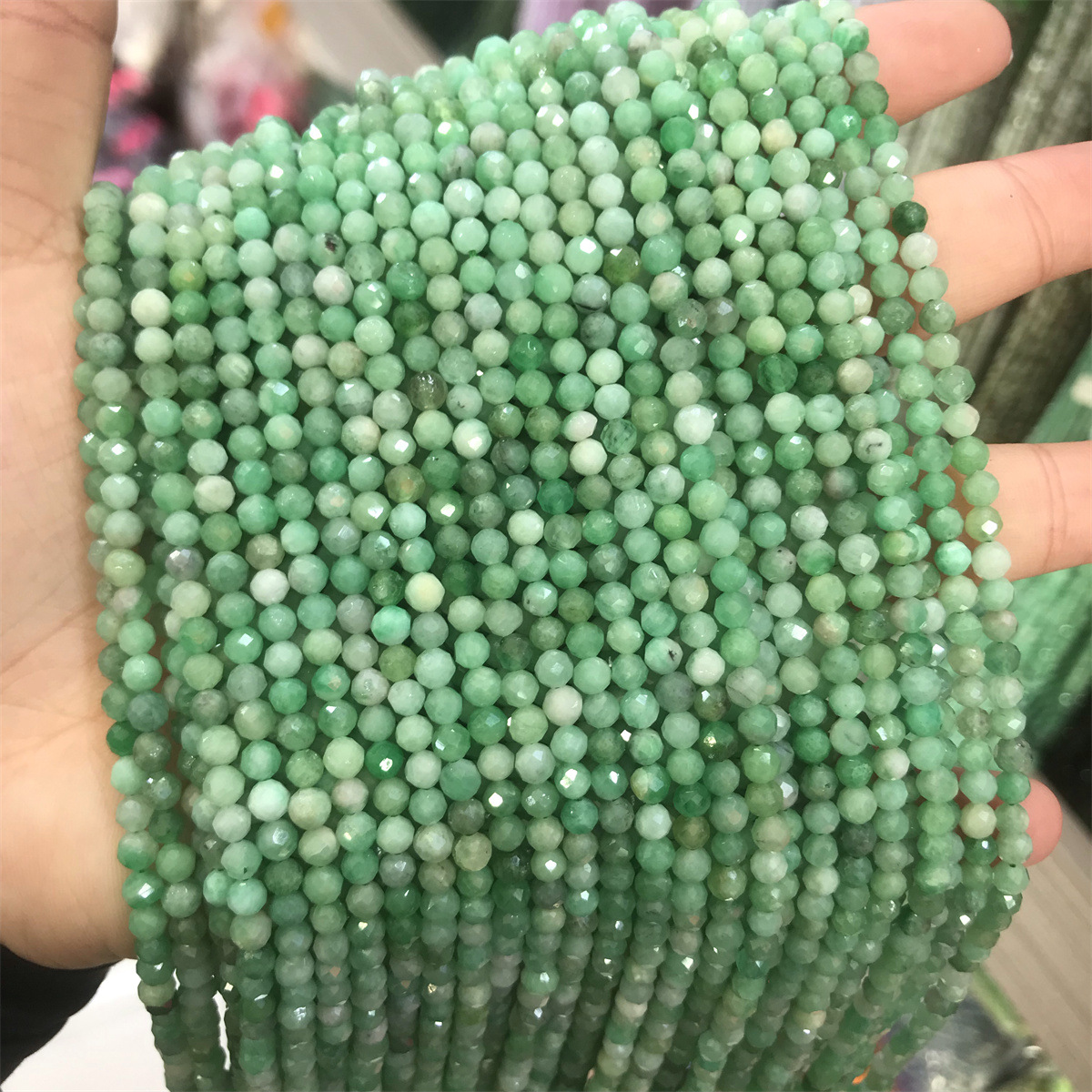 3:4mm faceted bead emerald