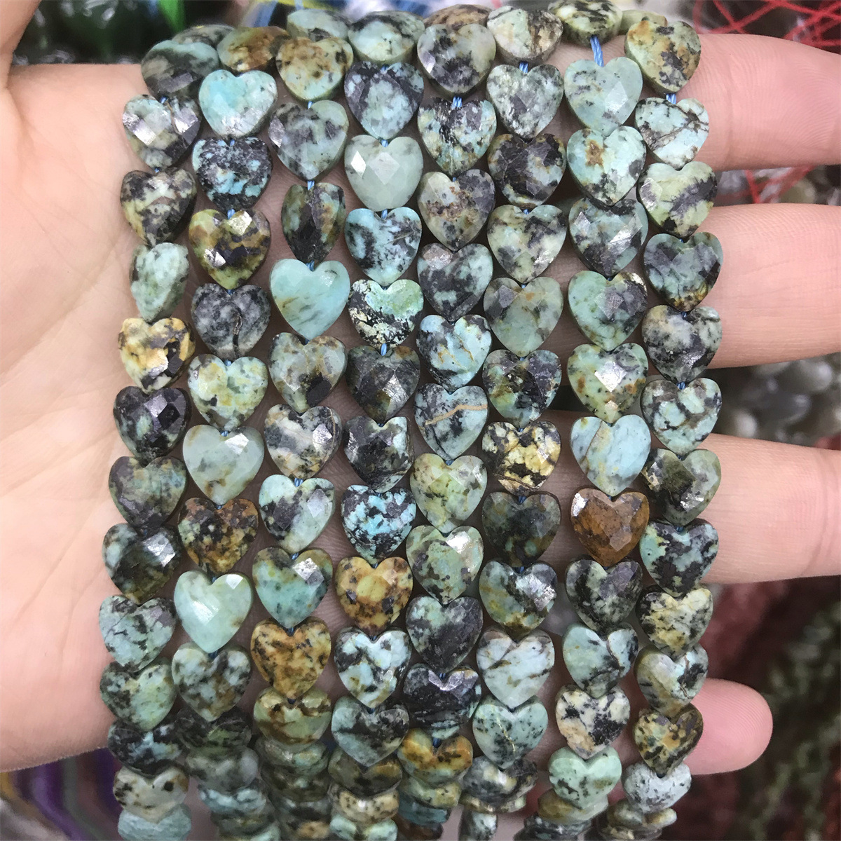 09-african pine 8mm faceted heart shape, about 22