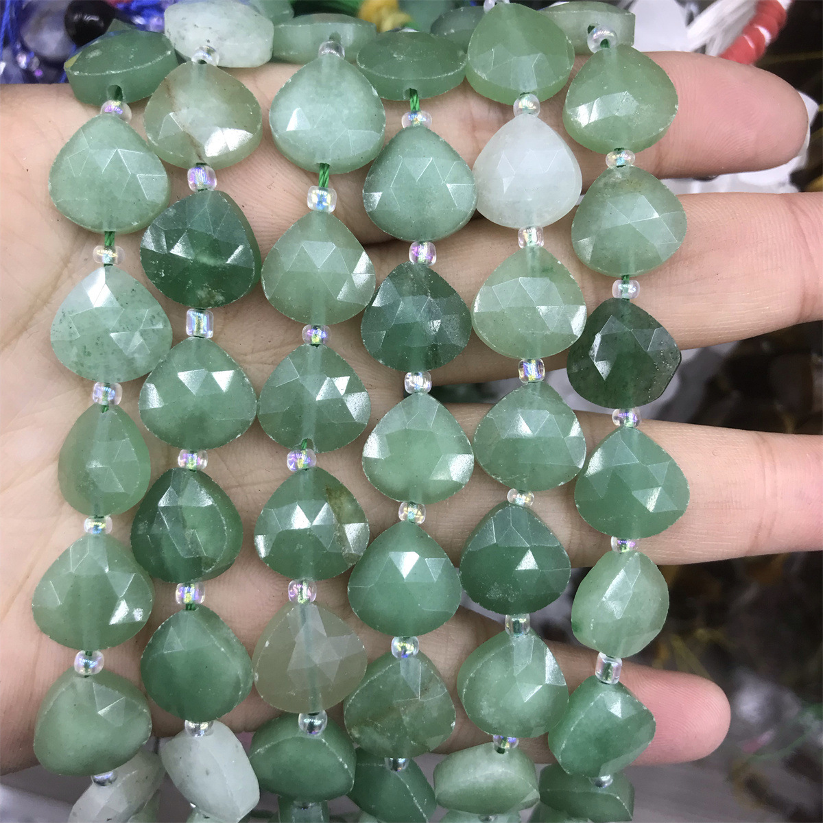 10-green aventurine 12mm fat triangle, about 12 pi