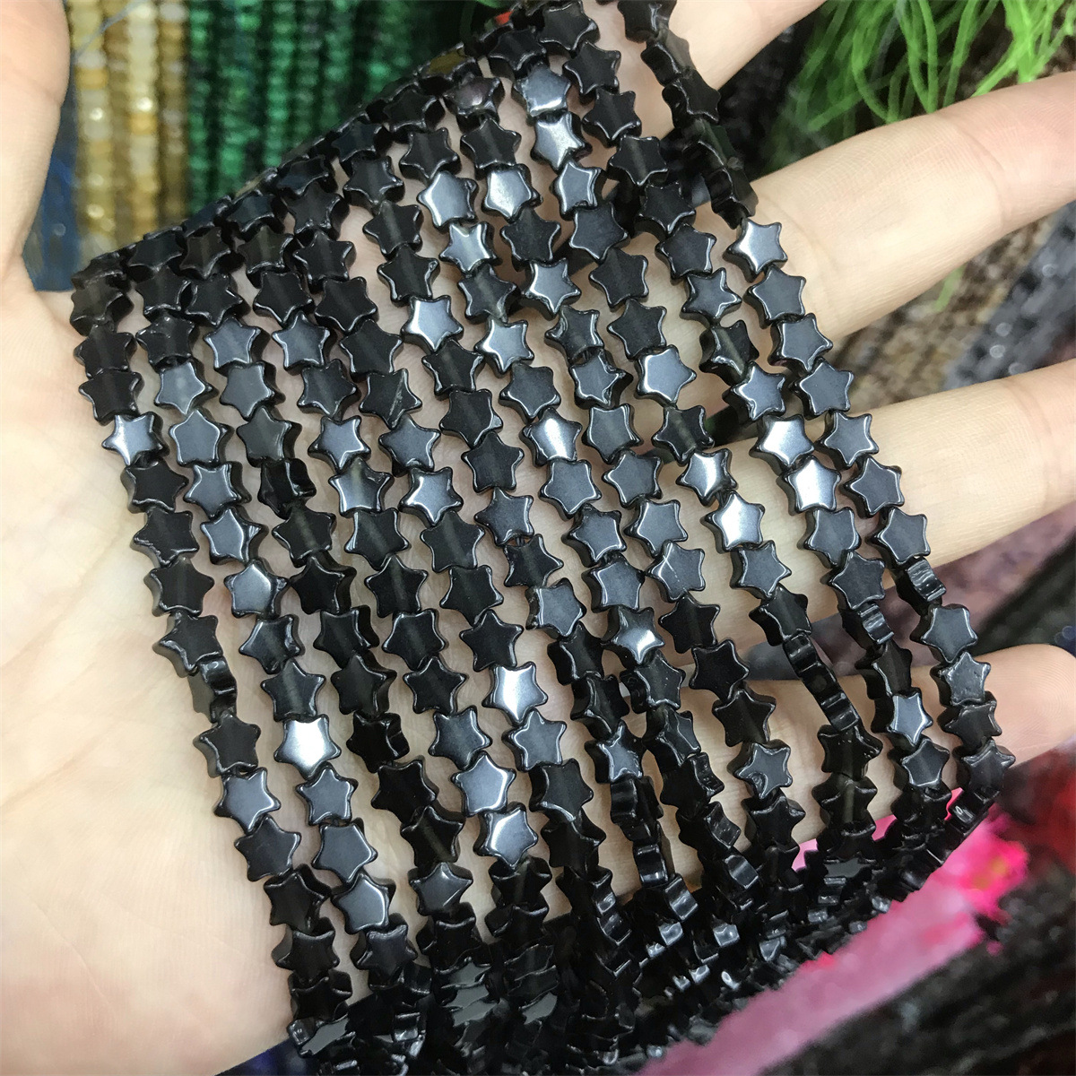 25- obsidian 6mm star shape, about 70 pieces per p