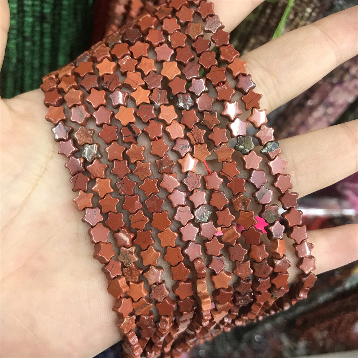 28-red stone 6mm star shape, about 70 pieces per p