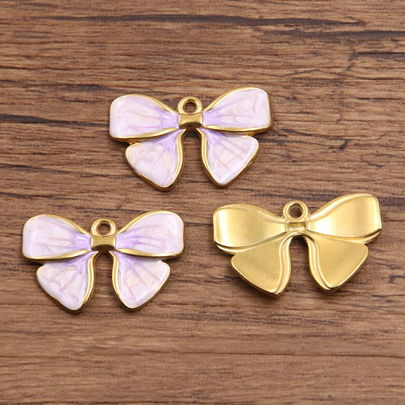 10:No. 3 purple bow 16x25mm 3g