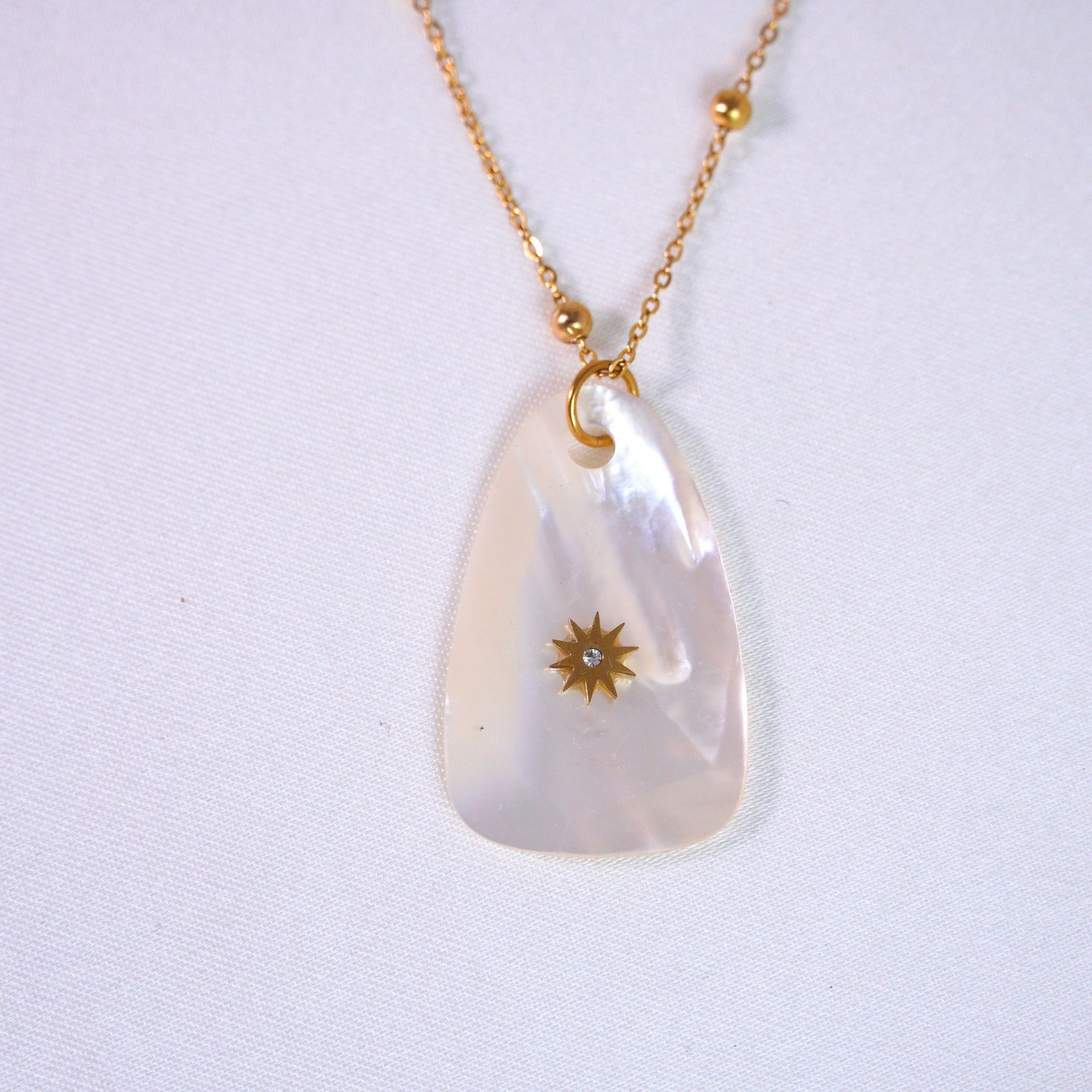 8:Faceted white shell