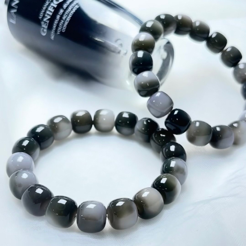 14:Small black bottle old barrel single ring