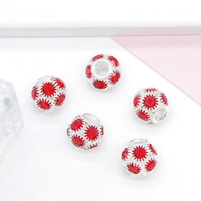 10:A large red diamond with a silver base