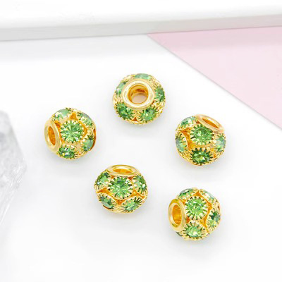 13:Gold base with light green diamond