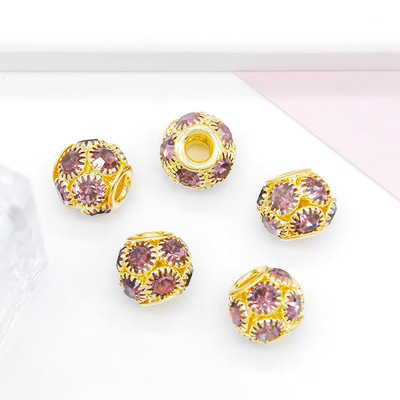 15:Light purple diamond with a gold base