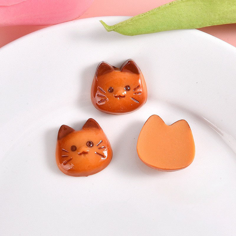 The cat's face is brown. Cookie baking biscuits