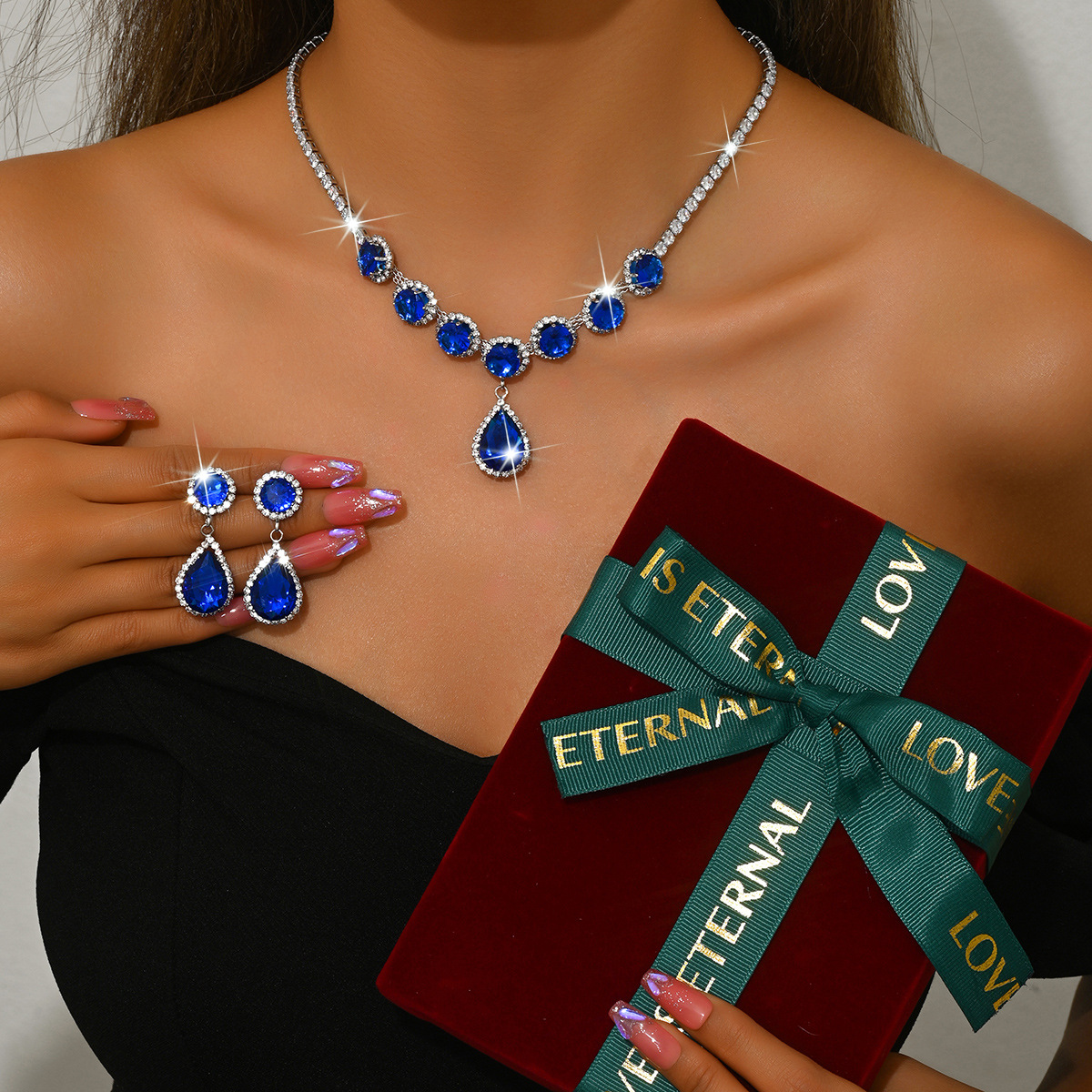 5:sapphire blue necklace   earrings   large red box