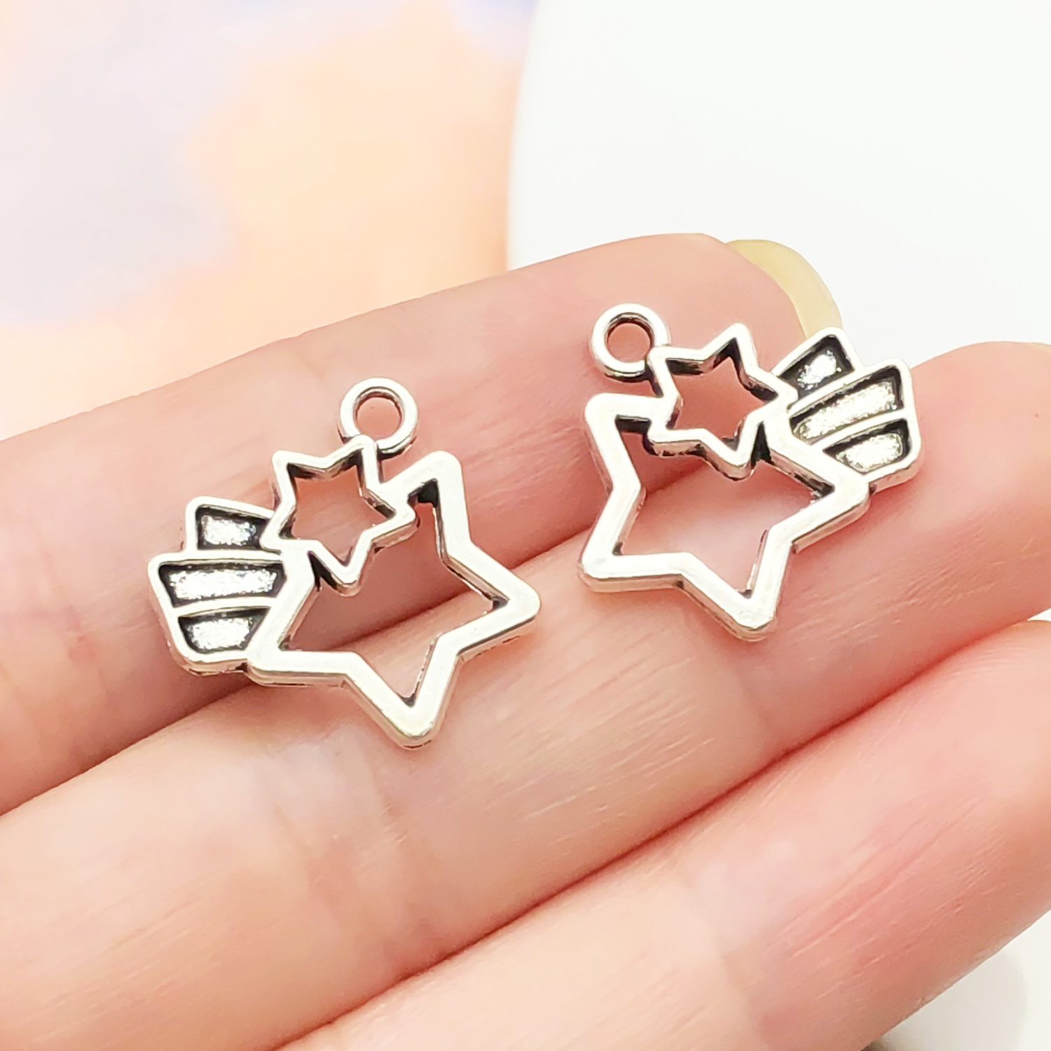 3:15645-1 ancient silver zinc alloy rainbow star meteor hollow frame 16x15-1.4g