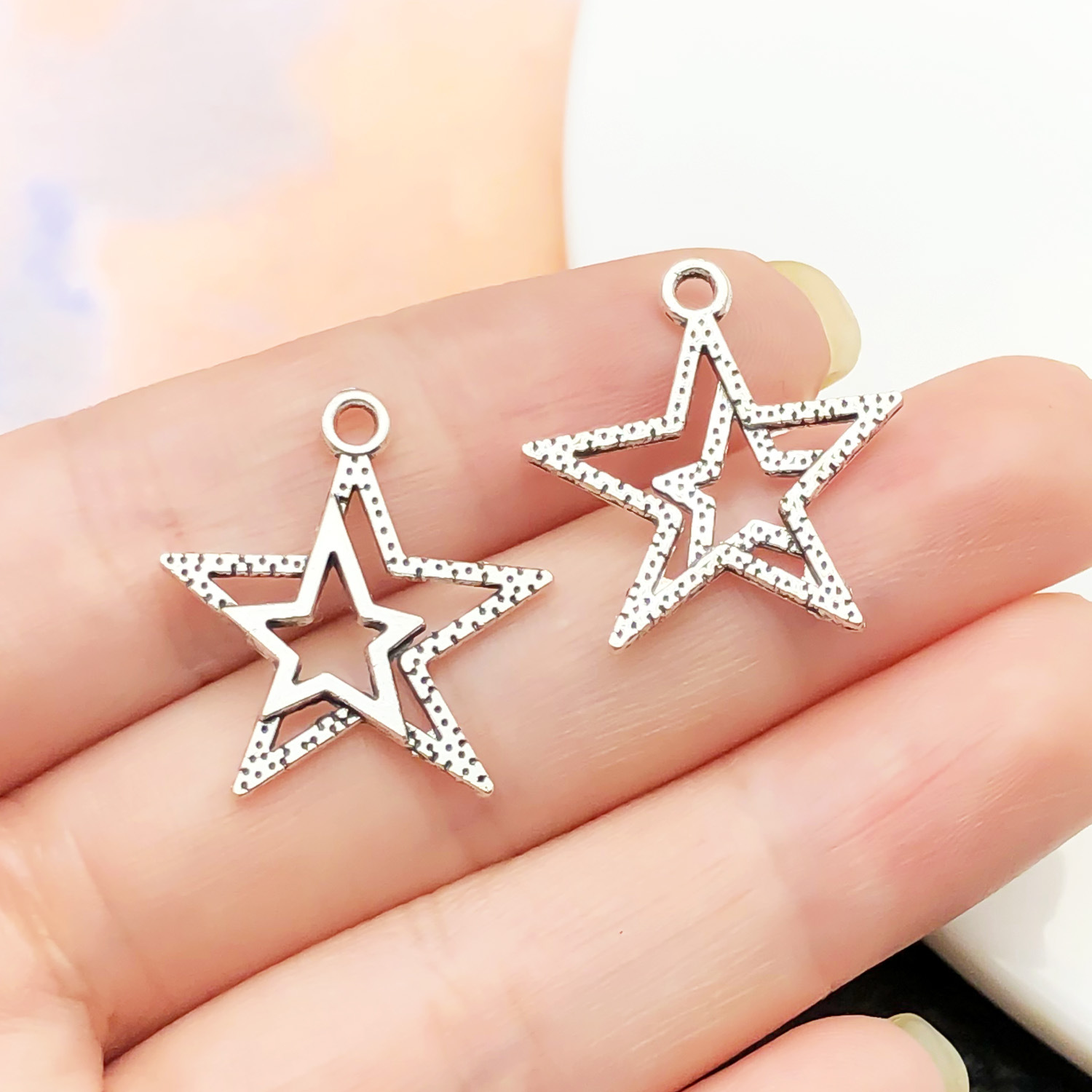 7:22335-1 ancient silver zinc alloy single-sided five-pointed star 22x20mm-0.8g (small star on the left)