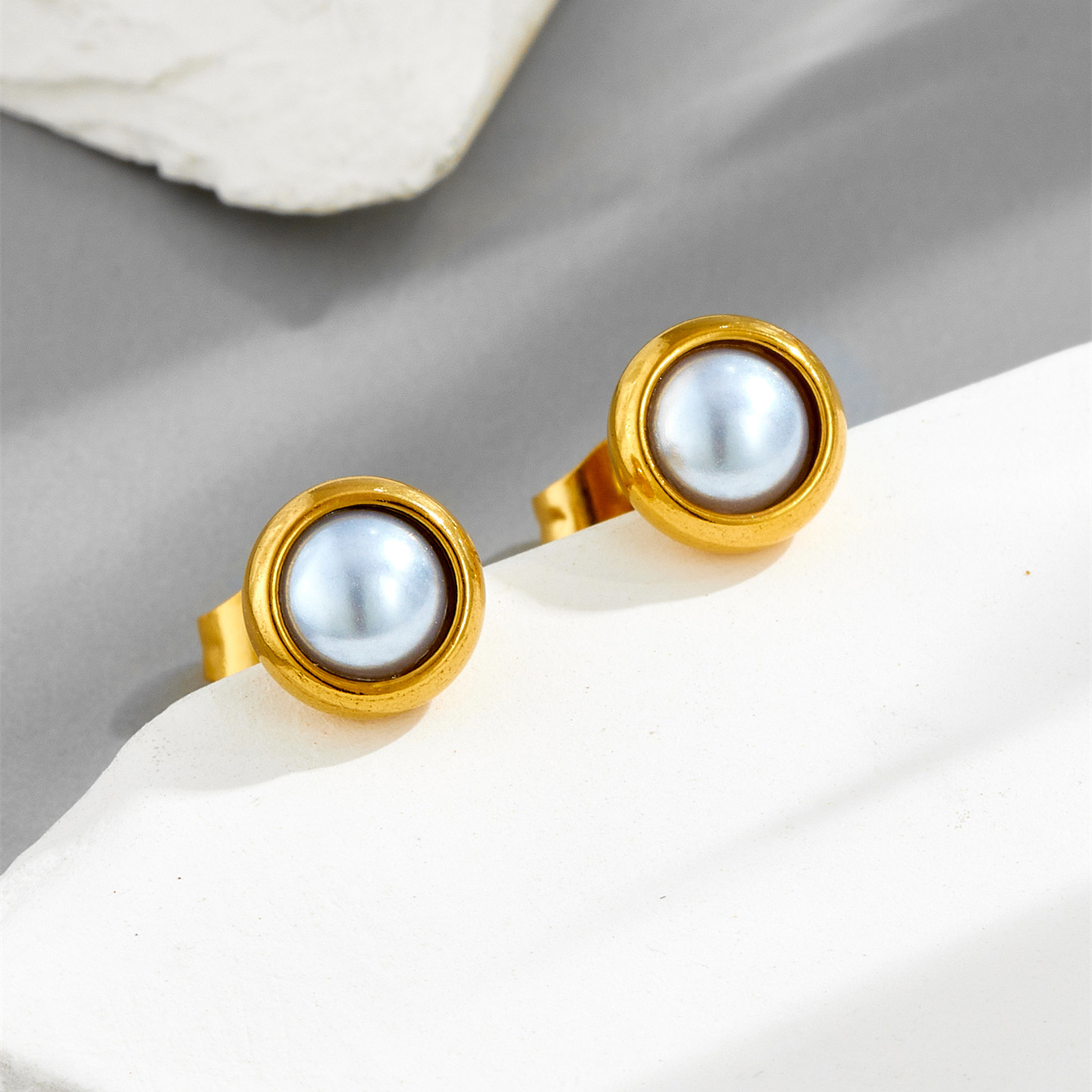 White pearl stud earrings