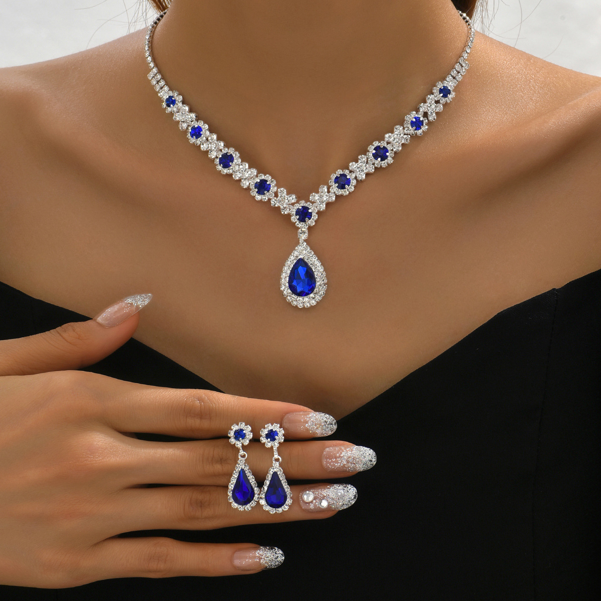 7:907 sapphire necklace earrings