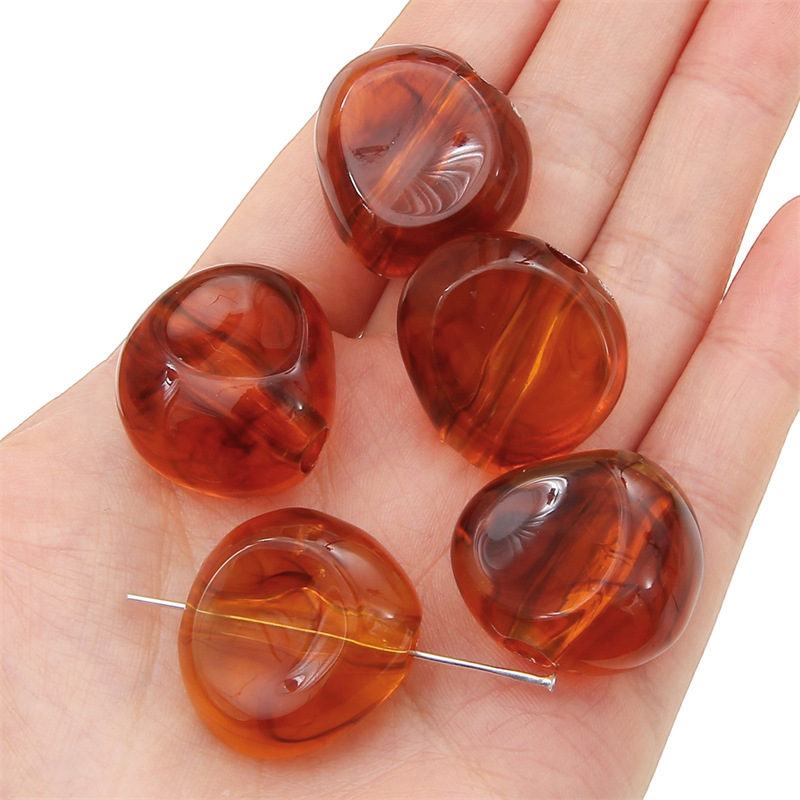 10:Amber shaped beads 26x 24mm/ aperture about 5mm 5/bag