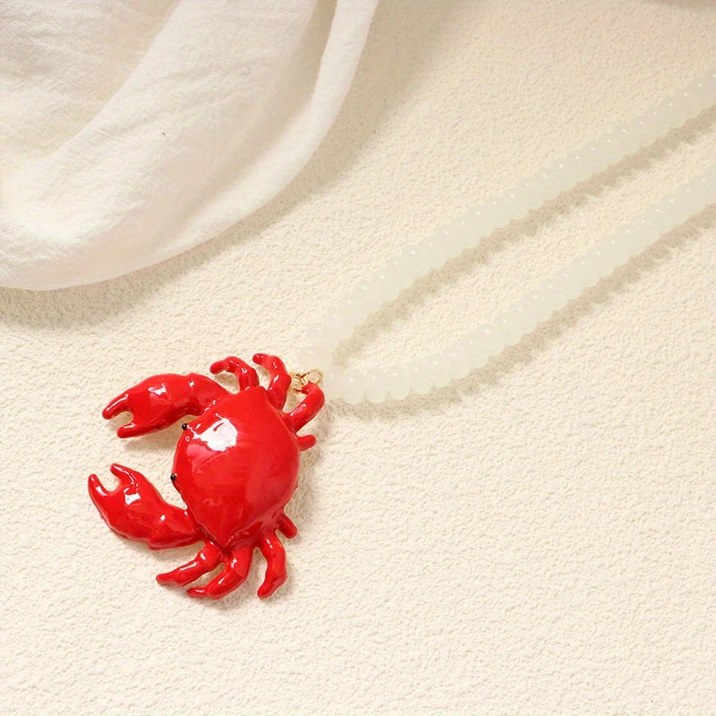 2:White beaded red crab necklace
