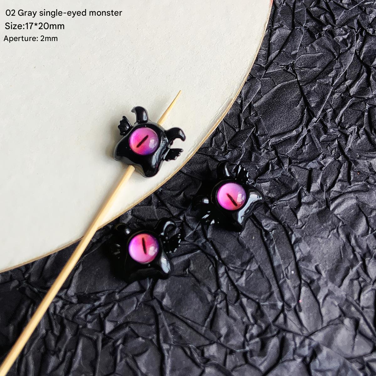 2:02 /17x20mm/black one-eyed little monster (1)