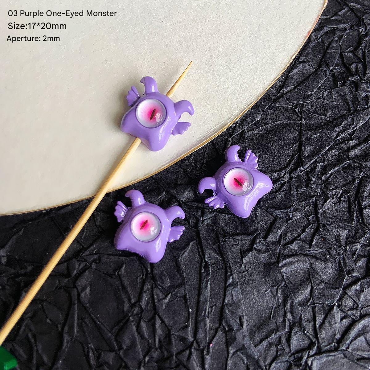3:03/17x20mm/ purple one-eyed little monster (1)