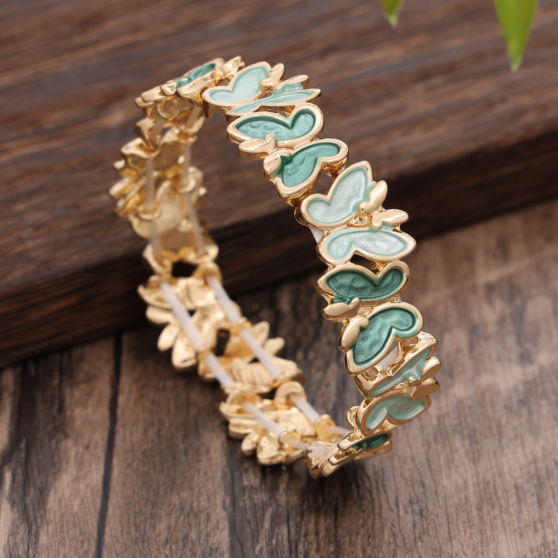 3:light green butterfly bracelet-gold