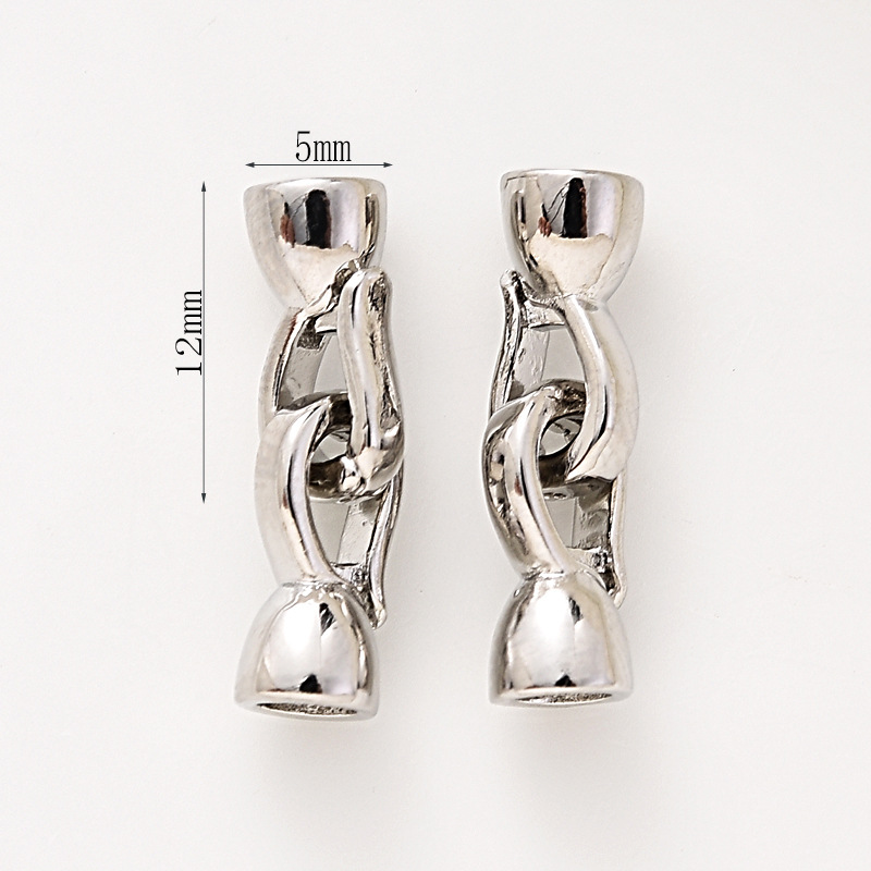 2:#232 pair of white gold buttons (two)