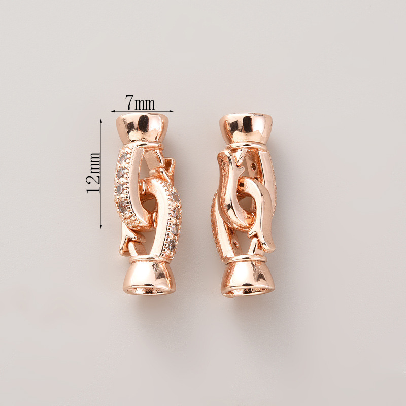 9:#281 pair of rose gold with zirconium buttons (two)