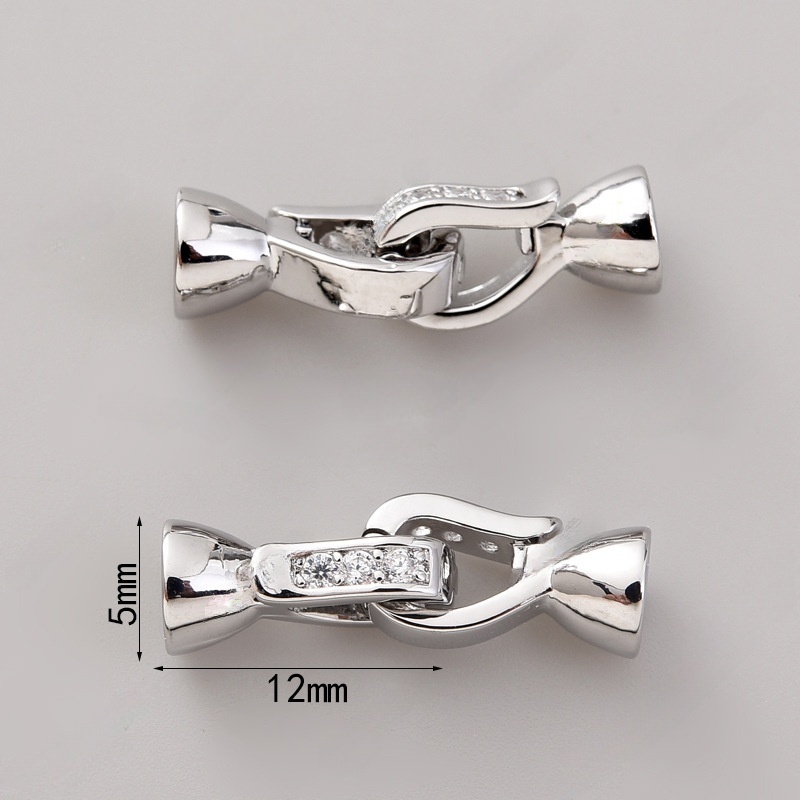 #1294 pair of platinum zirconium buttons (two)