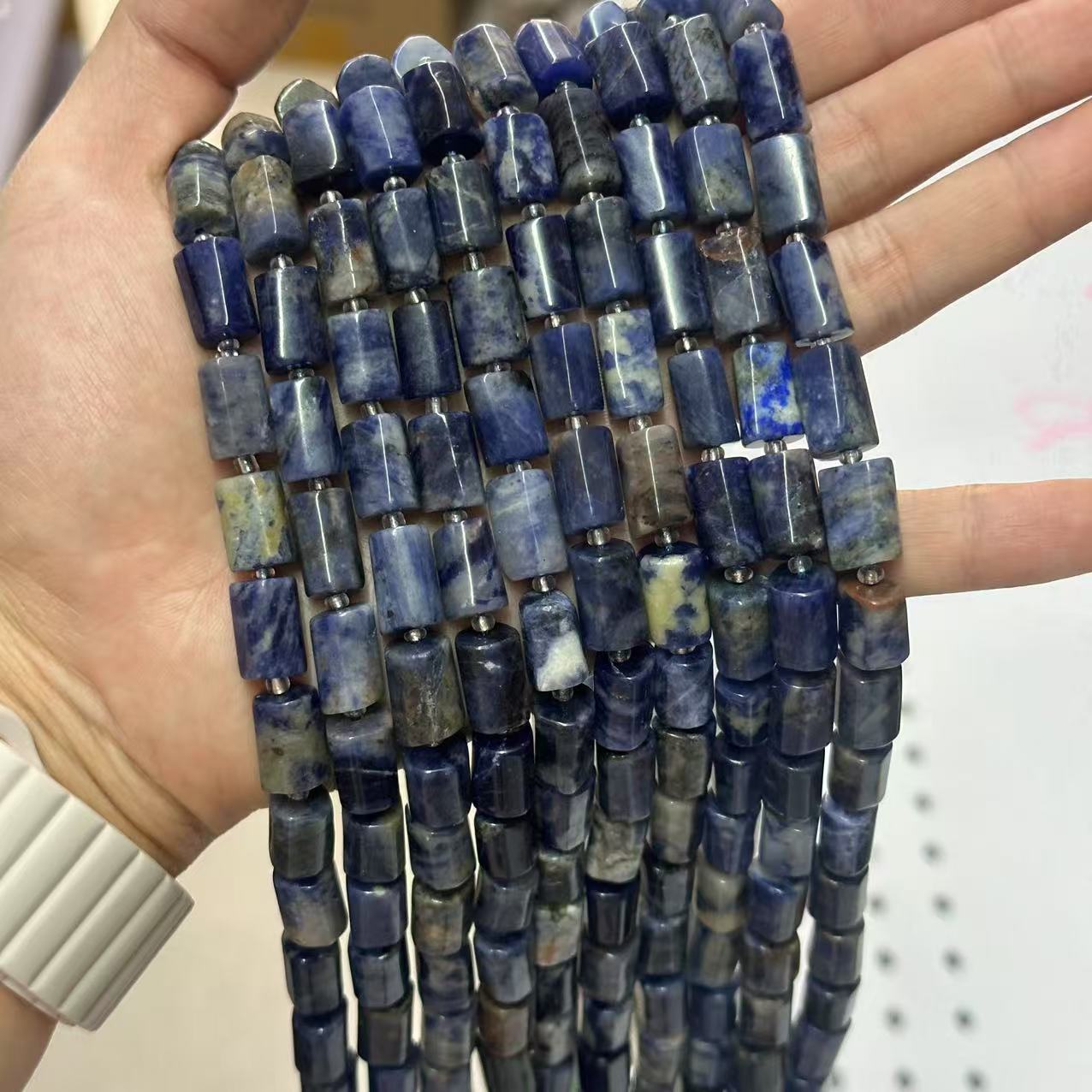 Blue stone is about 7*13mm (small capsules, smooth